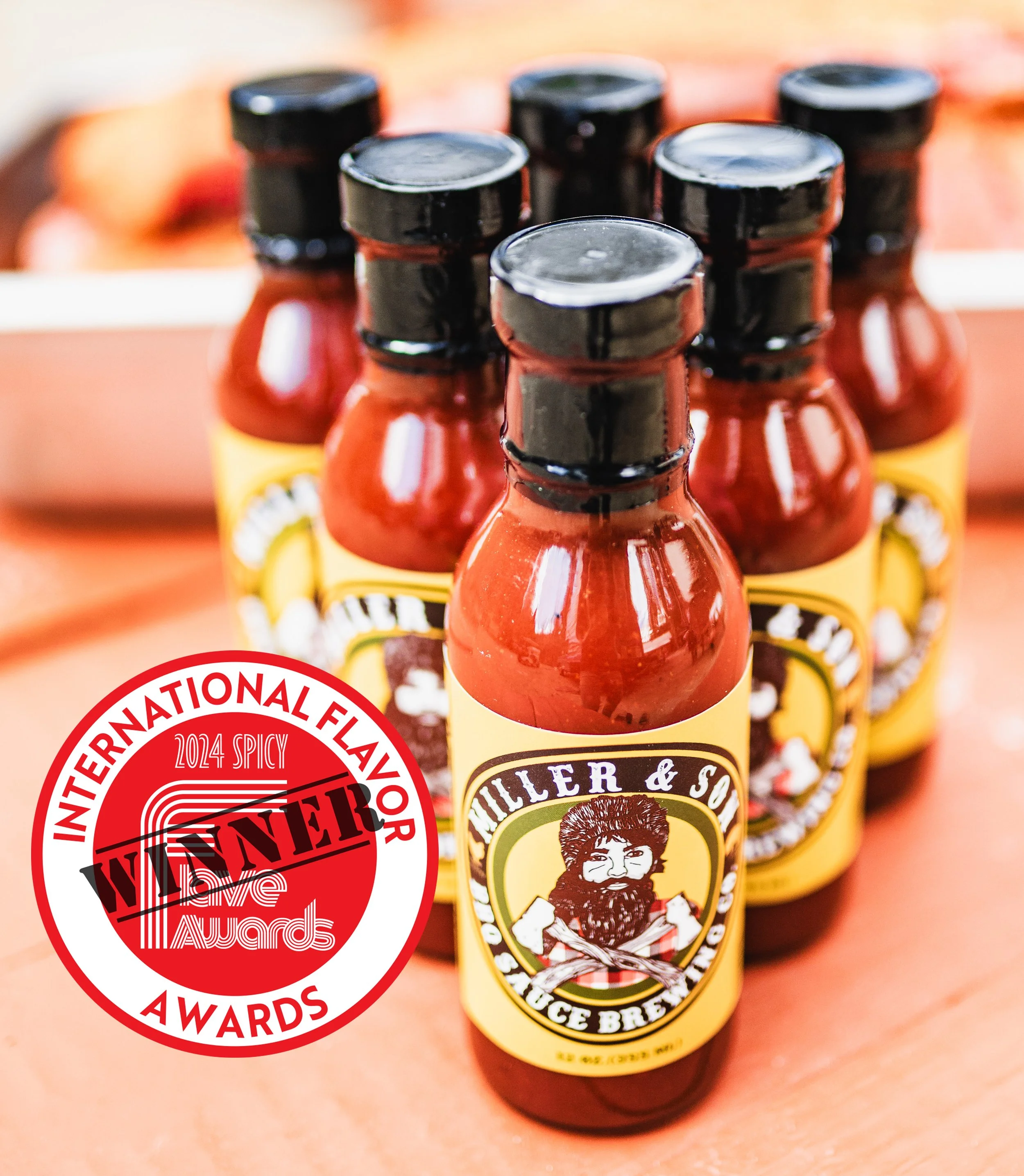 Miller and Son BBQ sauce bottles lineup — International Flavor 2024 Spicy Winner